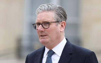 British Prime Minister Keir Starmer leaves after the multinational virtual summit and press conference at the Elysee Presidential Palace in Paris, April 17, 2026 (Tom Nicholson/Pool Photo via AP)