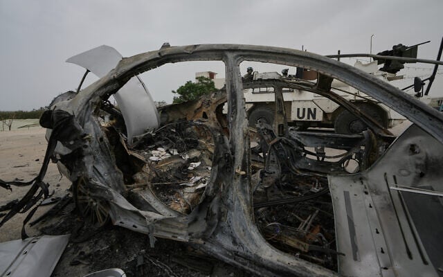 French UN peacekeepers sitting on their armored personnel carrier are seen through a destroyed car in Qasmiyeh, near Tyre city, southern Lebanon, April 18, 2026. (AP Photo/Bilal Hussein) French UN peacekeepers sitting on their armored personnel carrier are seen through a destroyed car in Qasmiyeh, near Tyre city, southern Lebanon, April 18, 2026. (AP Photo/Bilal Hussein)
