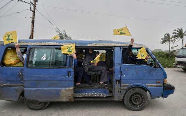 Displaced people sit in a van and wave Hezbollah flags, as they return to their villages on the second day of a ceasefire between Hezbollah and Israel in Qasmiyeh, near Tyre city, southern Lebanon, April 18, 2026. (AP Photo/Bilal Hussein) Displaced people sit in a van and wave Hezbollah flags, as they return to their villages on the second day of a ceasefire between Hezbollah and Israel in Qasmiyeh, near Tyre city, southern Lebanon, April 18, 2026. (AP Photo/Bilal Hussein)