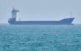 A tanker sits anchored in the Strait of Hormuz off the coast of Qeshm Island, Iran, April 18, 2026. (AP Photo/Asghar Besharati)