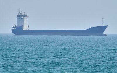 A tanker sits anchored in the Strait of Hormuz off the coast of Qeshm Island, Iran, April 18, 2026. (AP Photo/Asghar Besharati)