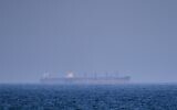 A bulk carrier ship anchored in the Strait of Hormuz, April 18, 2026. (AP Photo)