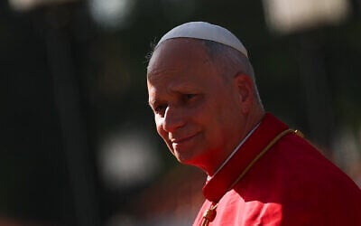 Pope Leo XIV arrives at the Presidential Palace for his meeting with Angola's President Joao Lourenco in Luanda, Angola, April 18, 2026. (Guglielmo Mangiapane/Pool Photo via AP)