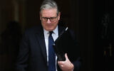 Britain's Prime Minister Keir Starmer leaves 10 Downing Street in London, Monday, April 20, 2026 to face a showdown in Parliament over the appointment of Peter Mandelson as ambassador to Washington. (AP Photo/Alastair Grant)