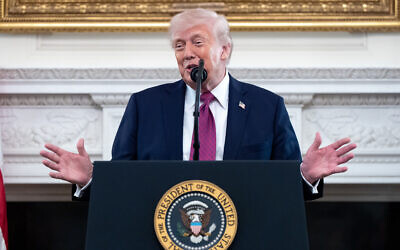 US President Donald Trump speaks during an event for NCAA national champions in the State Dining Room of the White House, April 21, 2026, in Washington. (AP Photo/Alex Brandon)