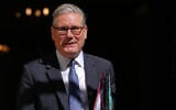 Britain's Prime Minister Keir Starmer leaves 10 Downing Street to attend the weekly session of Prime Minister's Questions in parliament in London, April 22, 2026. (AP/Kirsty Wigglesworth)