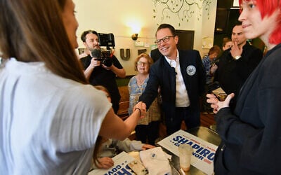 Pennsylvania Governor Josh Shapiro greets members of the crowd after speaking at a Clinton County Democratic Party event at the Avenue 209 coffee shop, April 11, 2026, in Lock Haven, Pennsylvania. (AP/Marc Levy)