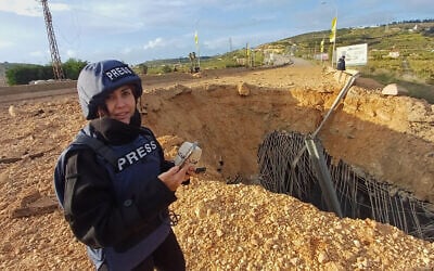 Lebanese journalist Amal Khalil, who works for the pro-Hezbollah daily Al-Akhbar newspaper, reports near a destroyed bridge in Qasmiyeh, Lebanon, March 22, 2026. (AP Photo/Mohammed Zaatari) Lebanese journalist Amal Khalil, who works for the pro-Hezbollah daily Al-Akhbar newspaper, reports near a destroyed bridge in Qasmiyeh, Lebanon, March 22, 2026. (AP Photo/Mohammed Zaatari)