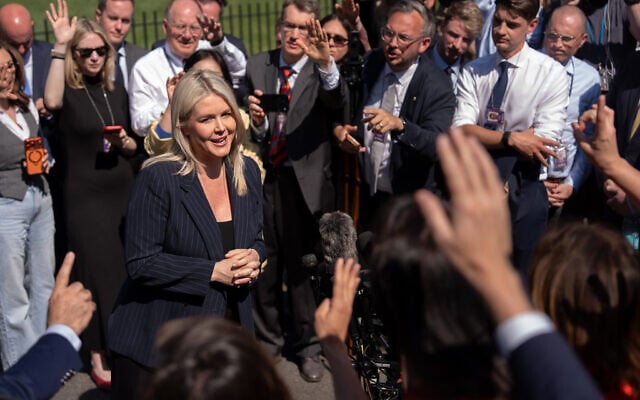 White House press secretary Karoline Leavitt speaks with reporters outside the White House, April 22, 2026, in Washington. (AP Photo/Mark Schiefelbein)