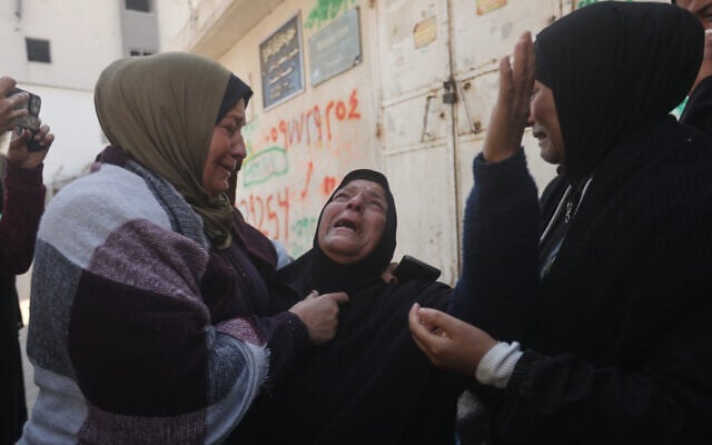 Palestinians mourn over people killed in an Israeli strike during their funeral at Al-Shifa Hospital in Gaza City, April 25, 2026. (AP Photo/Yousef Alzanoun) Palestinians mourn over people killed in an Israeli strike during their funeral at Al-Shifa Hospital in Gaza City, April 25, 2026. (AP Photo/Yousef Alzanoun)