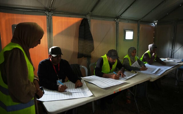 An election committee sorts the lists of candidates in local elections in Deir al-Balah, central Gaza Strip, Saturday, April 25, 2026. (AP Photo/Abdel Kareem Hana) An election committee sorts the lists of candidates in local elections in Deir al-Balah, central Gaza Strip, Saturday, April 25, 2026. (AP Photo/Abdel Kareem Hana)