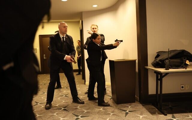 Secret Service agents respond to a threat during the White House Correspondents' Dinner, Saturday, April 25, 2026, in Washington. (AP Photo/Tom Brenner) Secret Service agents respond to a threat during the White House Correspondents' Dinner, Saturday, April 25, 2026, in Washington. (AP Photo/Tom Brenner)