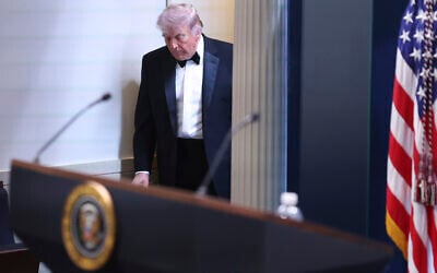 US President Donald Trump arrives at the James Brady Press Briefing Room at the White House after a shooting at the annual White House Correspondents' Association Dinner in Washington, April 25, 2026. (AP Photo/Tom Brenner)