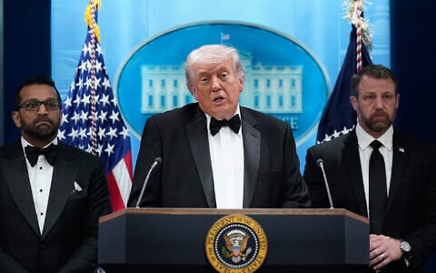 US President Donald Trump speaks in the James Brady Press Briefing Room at the White House after a security threat at the annual White House Correspondents' Association Dinner in Washington, April 25, 2026, as FBI director Kash Patel and Homeland Security Secretary Markwayne Mullin listen. (AP Photo/Jose Luis Magana)