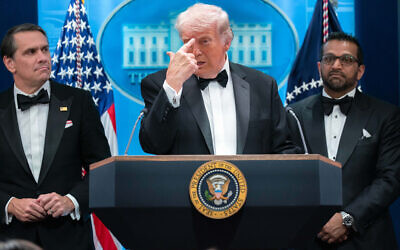 US President Donald Trump gestures during a press conference after a shooting incident outside the White House Correspondents' Association dinner in Washington, April 25, 2026, as acting Attorney General Todd Blanche and FBI director Kash Patel listen. (AP/Jose Luis Magana)