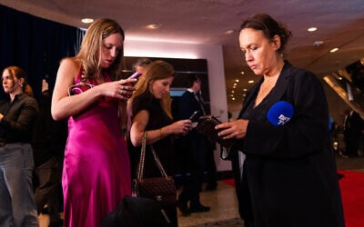 Journalists that were in attendance for the White House Correspondents Dinner prepare for a press briefing at the Washington Hilton following an incident that disrupted the event, Saturday, April 25, 2026, in Washington. (AP Photo/Allison Robbert) Journalists that were in attendance for the White House Correspondents Dinner prepare for a press briefing at the Washington Hilton following an incident that disrupted the event, Saturday, April 25, 2026, in Washington. (AP Photo/Allison Robbert)