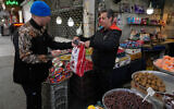 People conduct their businesses around the traditional grand bazaar of Tehran, Iran, March 29, 2026. (Vahid Salemi/AP)
