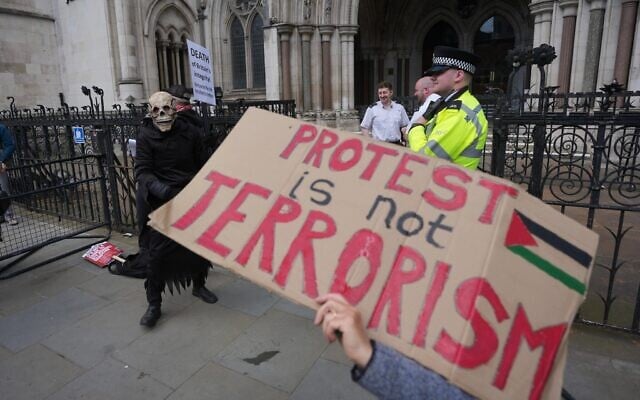 Supporters of Palestine Action stage a protest outside the Royal Court of Justice in London,, April 28, 2026. (AP Photo/Kin Cheung) Supporters of Palestine Action stage a protest outside the Royal Court of Justice in London,, April 28, 2026. (AP Photo/Kin Cheung)