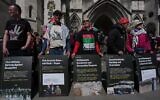 Supporters of Palestine Action stage a protest outside the Royal Court of Justice in London, April 28, 2026. (AP Photo/Kin Cheung)