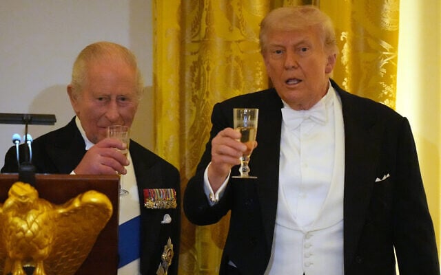 Britain's King Charles III toasts with US President Donald Trump during a State Dinner with first lady Melania Trump and Queen Camilla in the East Room of the White House State Dinner, April 28, 2026, in Washington. (AP Photo/Alex Brandon)