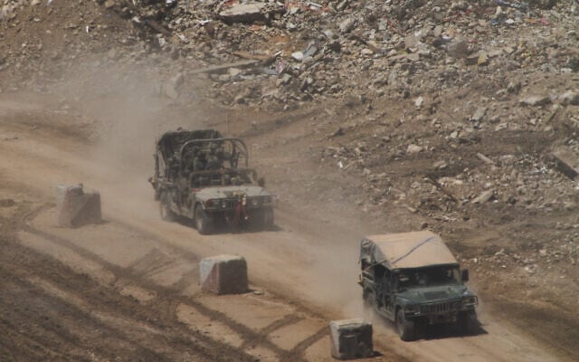 IDF soldiers operate in southern Lebanon, as seen from northern Israel, April 29, 2026. (AP Photo/Ariel Schalit)