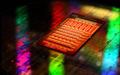 Illustration: A CMOS silicon photonics chip. (Courtesy: IBM Research/AP)