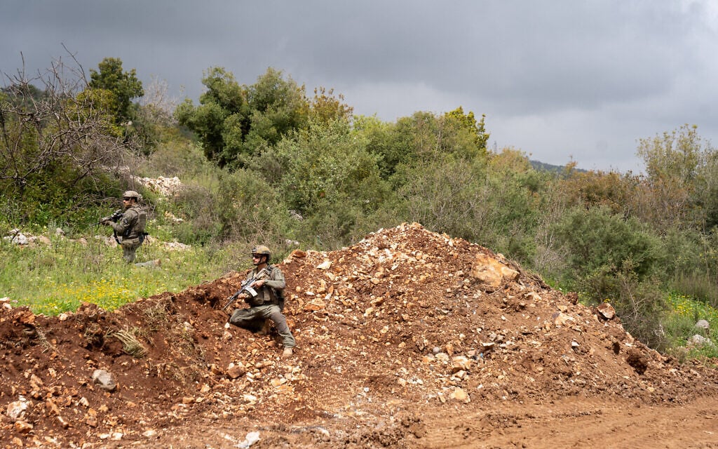 Israeli troops are seen near the southern Lebanon village of Ayta ash-Shab, April 19, 2026. (Emanuel Fabian/Times of Israel)