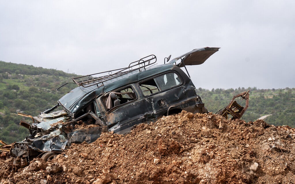 A destroyed car is seen in the southern Lebanon village of Ayta ash-Shab, April 19, 2026. (Emanuel Fabian/Times of Israel)