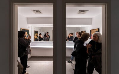 Small groups touring through the basement rooms of the Tel Aviv Museum of Art, seeing works from 'End of the Day: One Hundred Years of the New Objectivity Movement' during April 2026. (Daniel Hanoch) Small groups touring through the basement rooms of the Tel Aviv Museum of Art, seeing works from 'End of the Day: One Hundred Years of the New Objectivity Movement' during April 2026. (Daniel Hanoch)