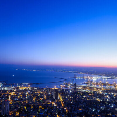 View of Haifa at sunrise, September 24, 2024 (Chaim Goldberg/Flash90)