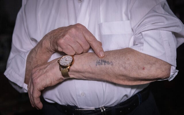 Portrait of Dov Landau, a 97-year-old Holocaust survivor, in his home in Tel Aviv, October 14, 2024. (Chaim Goldberg/Flash90) Portrait of Dov Landau, a 97-year-old Holocaust survivor, in his home in Tel Aviv, October 14, 2024. (Chaim Goldberg/Flash90)