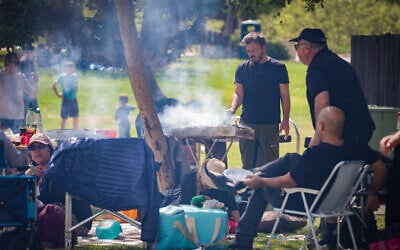 File: People barbecue during Passover in Herzliya, April 13, 2025 (Tal Gal/Flash90)