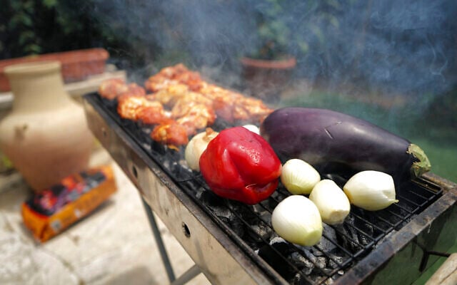 Illustrative: Meat and vegetables are seen on a grill during an Israeli Independence Day barbecue in the Golan Heights town of Katzrin, May 1, 2025. (Michael Giladi/Flash90) Illustrative: Meat and vegetables are seen on a grill during an Israeli Independence Day barbecue in the Golan Heights town of Katzrin, May 1, 2025. (Michael Giladi/Flash90)