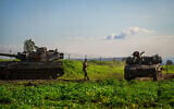 IDF soldiers at a staging area near the Israeli border with Syria, February 28, 2026. (Michael Giladi/Flash90)