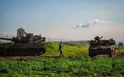 IDF soldiers at a staging area near the Israeli border with Syria, February 28, 2026. (Michael Giladi/Flash90)