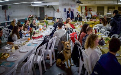 Israelis celebrate the Passover Seder in an underground central Israel parking lot used as a public shelter during the ongoing war with Iran and Hezbollah, April 1, 2026. (Flash90) Israelis celebrate the Passover Seder in an underground central Israel parking lot used as a public shelter during the ongoing war with Iran and Hezbollah, April 1, 2026. (Flash90)