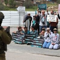 Jews and Palestinians protest against a law passed by the Knesset imposing the death penalty in the West Bank city of Beit Jala, on April 3, 2026. (Wisam Hashlamoun/Flash90)