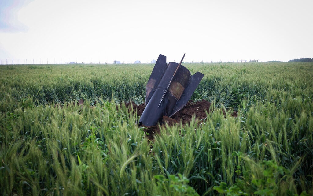 Part of a missile fired from Iran toward Israel is seen after it hit the ground in the Golan Heights, April 7, 2026. (Maor Kinsbursky/Flash90)