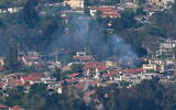 Smoke rises from the northern city of Kiryat Shmona after a rocket fired by Hezbollah from Lebanon struck the city, April 16, 2026. (Ayal Margolin/Flash90)