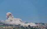 Smoke rises from southern Lebanon during an IDF operation, April 17, 2026. (Ayal Margolin/Flash90)