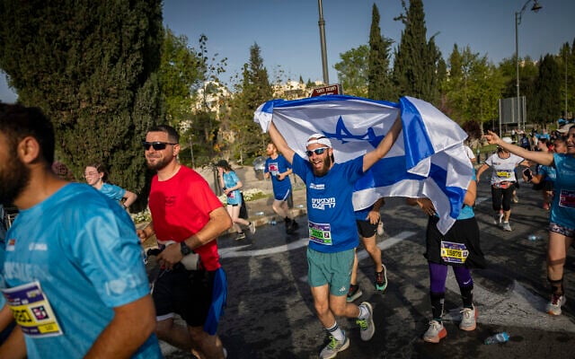 People run in the annual Jerusalem Marathon, April 17, 2026. (Yonatan Sindel/Flash90)