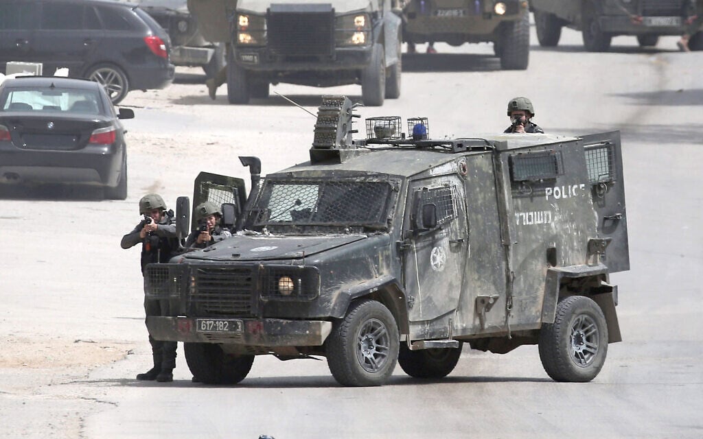 Israeli security forces operate during a raid in the West Bank city of Nablus on April 18, 2026. (Nasser Ishtayeh/Flash90) Israeli security forces operate during a raid in the West Bank city of Nablus on April 18, 2026. (Nasser Ishtayeh/Flash90)
