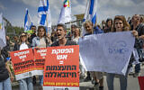 Residents of Kiryat Shmona protest against the ceasefire with Hezbollah outside the United States embassy in Jerusalem, April 19, 2026. (Yonatan Sindel/ Flash90)