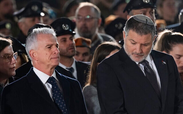 Mossad chief David Barnea (L) and Shin Bet chief David Zini at a Memorial Day ceremony at the Western Wall, in Jerusalem's Old City, April 20, 2026. (Chaim Goldberg/Flash90)