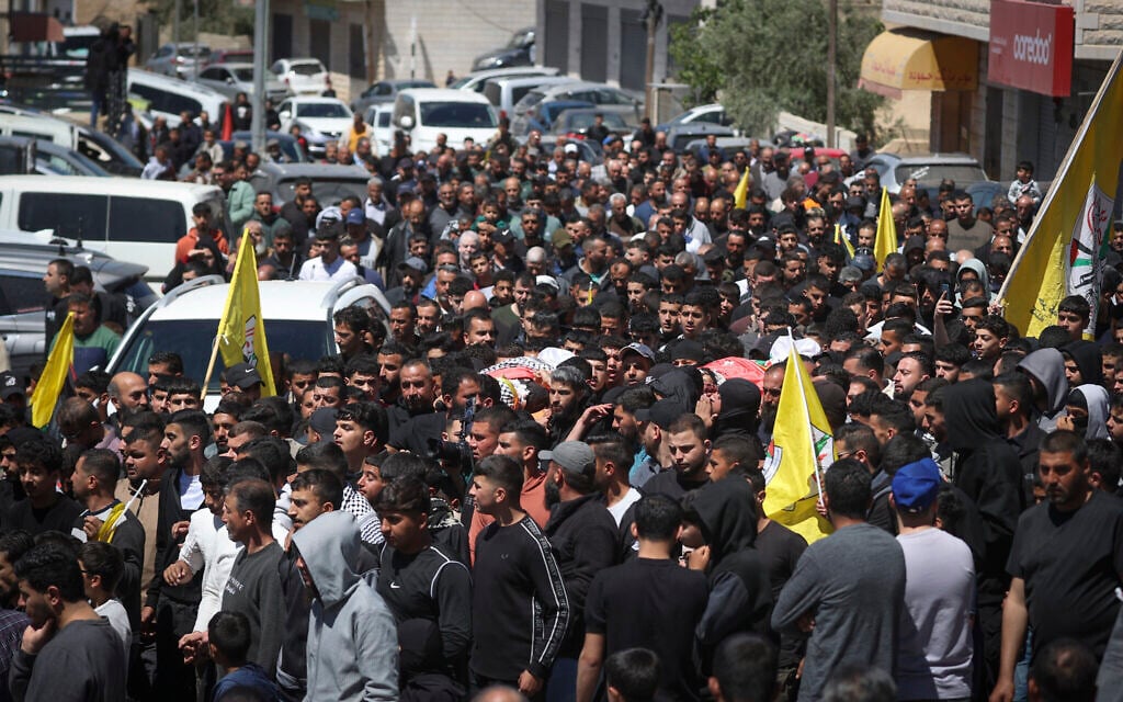 Palestinians attend the funeral of 14-year-old Aws Hamdi Al-Naasan and 32-year-old Marzouq Abu Naim, who were allegedly shot dead by an IDF reservist, in Al-Mughayyir, east of Ramallah, in the West Bank, April 22, 2026. (Flash90)