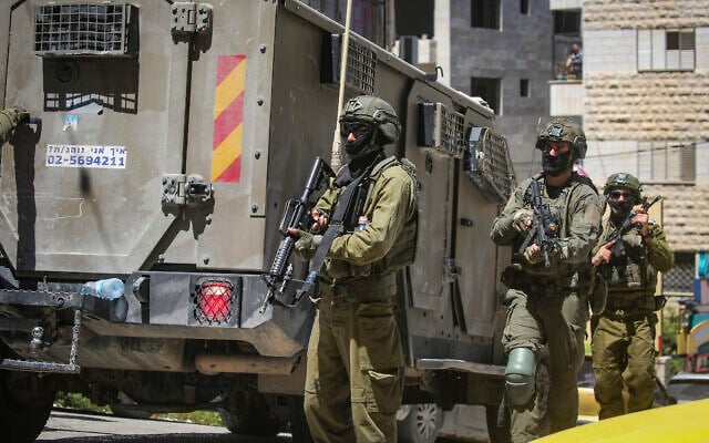 IDF soldiers operate during a raid on a cafe in the West Bank city of Nablus, April 23, 2026. (Nasser Ishtayeh/Flash90) IDF soldiers operate during a raid on a cafe in the West Bank city of Nablus, April 23, 2026. (Nasser Ishtayeh/Flash90)