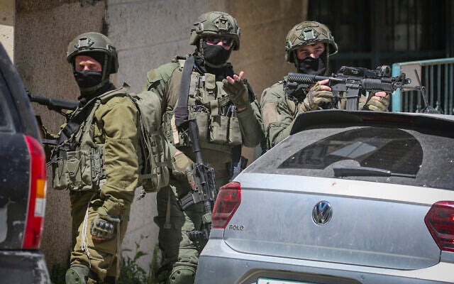 IDF soldiers operate during a raid on a cafe in the West Bank city of Nablus, April 23, 2026. (Nasser Ishtayeh/Flash90) IDF soldiers operate during a raid on a cafe in the West Bank city of Nablus, April 23, 2026. (Nasser Ishtayeh/Flash90)