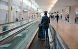 Travelers are seen at Ben Gurion International Airport, near Tel Aviv, April 23, 2026. (Nati Shohat/FLASH90)