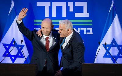 Opposition Leader Yair Lapid, right, and former prime minister Naftali Bennett appear at a press conference announcing their joint slate, called Together, in Herzliya, central Israel, April 26, 2026. (Chaim Goldberg/Flash90) Opposition Leader Yair Lapid, right, and former prime minister Naftali Bennett appear at a press conference announcing their joint slate, called Together, in Herzliya, central Israel, April 26, 2026. (Chaim Goldberg/Flash90)
