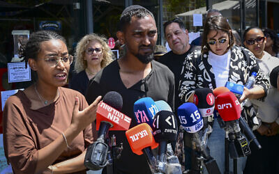 The family of Yemanu Zelka speaks to the press outside the pizzeria where he worked, close to the site where numerous youths murdered him after his shift on Independence Day, in Petah Tikva, April 27, 2026. (Avshalom Sassoni/ Flash90)